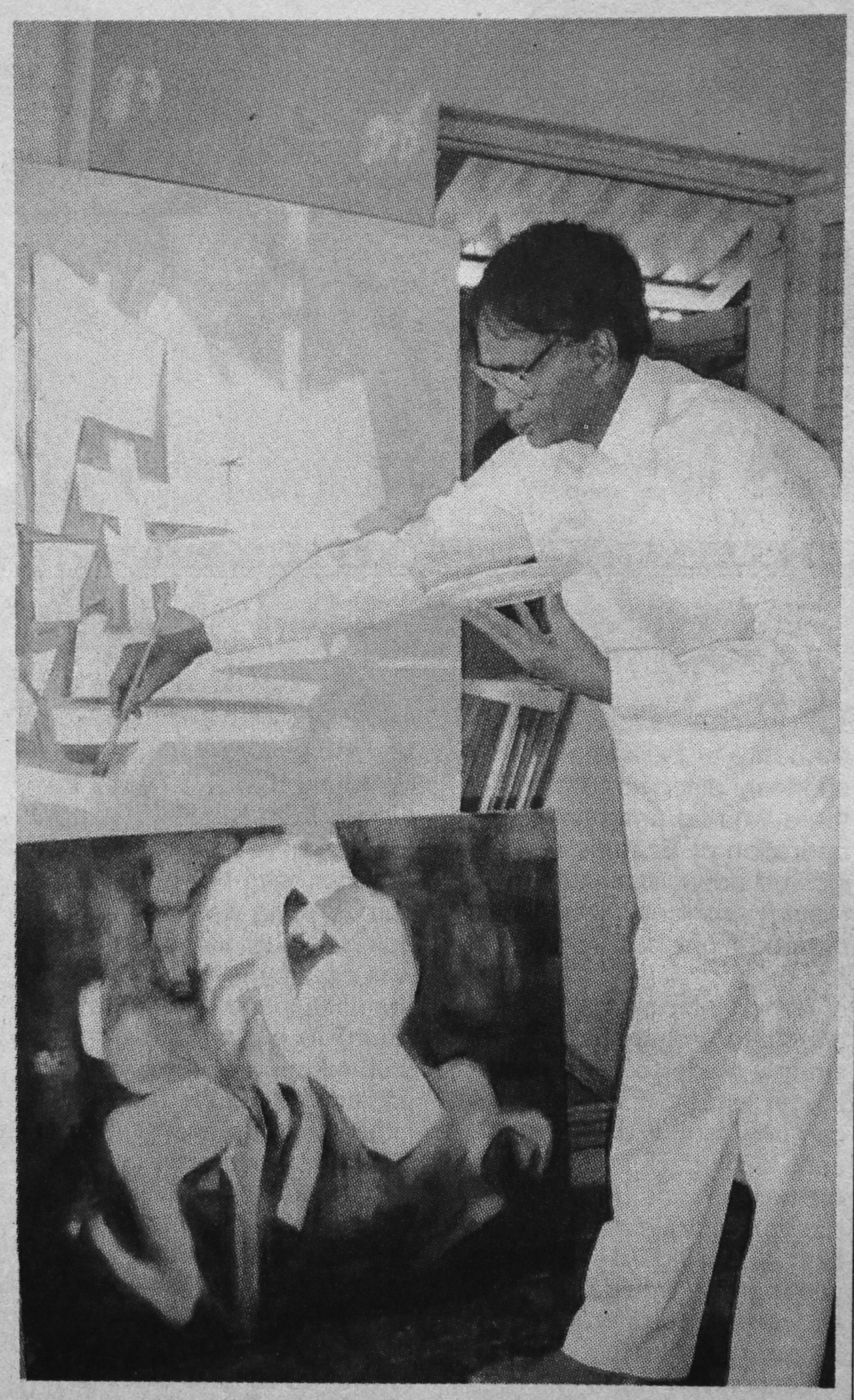 K.S. Vass painting at work in the studio